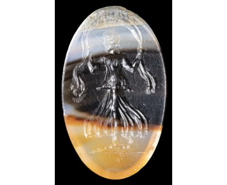 A ROMAN BANDED AGATE INTAGLIO. AURORA. 1st century A.D.9x14x2 mmBeautiful depiction of Aurora advancing to the left, holding 