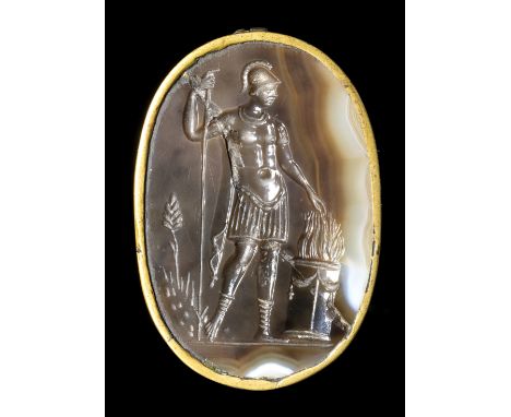 A LARGE LATE RENAISSANCE AGATE INTAGLIO SET IN A METAL FRAME. MUZIUS SCAEVOLA. 16th - 17th century. 32x46x4 mmThe soldier is 