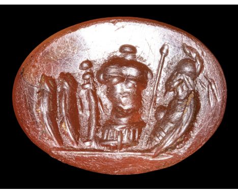 A ROMAN CARNELIAN INTAGLIO. PANOPLIA. 2nd  century A.D.9x12x3 mmThis depiction symbolizes the weapons of a soldier. From left