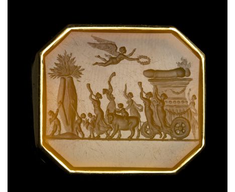 A NEOCLASSICAL LARGE CARNELIAN OCTAGONAL INTAGLIO SET IN A MODERN GOLD RING. EROTIC PROCESSION OF A PHALLUS. 19th centurySton