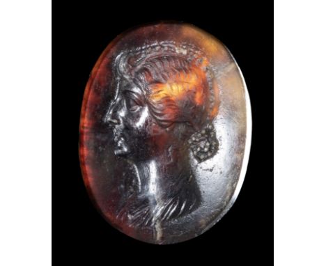 A FINE ROMAN AGATE INTAGLIO. PORTRAIT OF LIVIA.End of 1st century B.C. - Early 1st century A.D.9x12x2 mmThe imperial effigy i