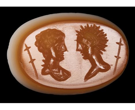 A LARGE ROMAN TWO LAYERED AGATE INTAGLIO. DOUBLE BUST PORTRAIT. 2nd - 3rd century A.D.12x19x4 mmTo the left side a draped mal