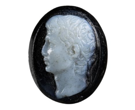 A GRAND TOUR TWO-LAYERS GLASS PASTE CAMEO. PORTRAIT OF AUGUST.19th century8x10x3 mmThe emperor is facing left. Small lack on 