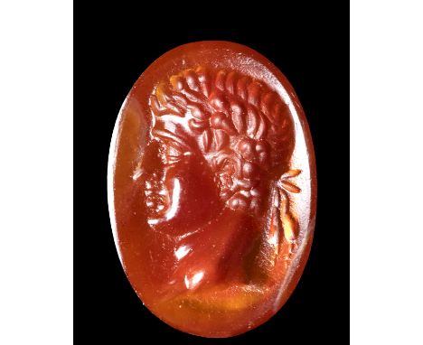 A ROMAN CARNELIAN INTAGLIO. PORTRAIT OF AUGUSTUS. 1st century A.D.11x15,5x4 mmThe laureated effigy of the emperor faces left.