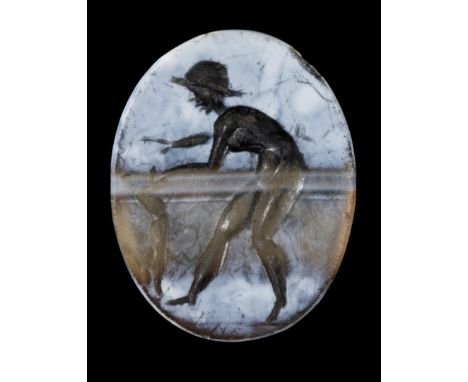 A ROMAN BURNT BANDED AGATE INTAGLIO. YOUNG SHEPHERD PLAYING WITH A HARE. 1st-2nd century A.D.10x12x3 mmThe male figure is fac