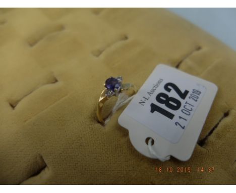An 18ct sapphire and diamond ring