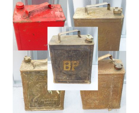 A group of four petrol cans comprising: 'BP' petrol motor spirit can;  'SHELL-MEX' petrol can;  'petroleum spirit' petrol can