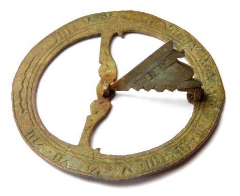 Post Medieval Pocket Sundial.  Circa, 16th-17th century AD. Copper-alloy, 3.87 g, 39.72 mm. A scarce dial from a pocket sun d