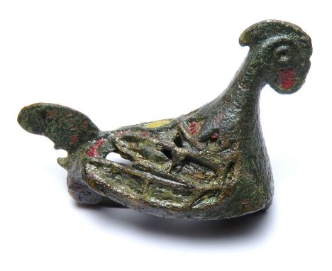 Roman chicken brooch. A three-dimensional zoomorphic plate brooch in the form of a chicken, the wings decorated with panels o