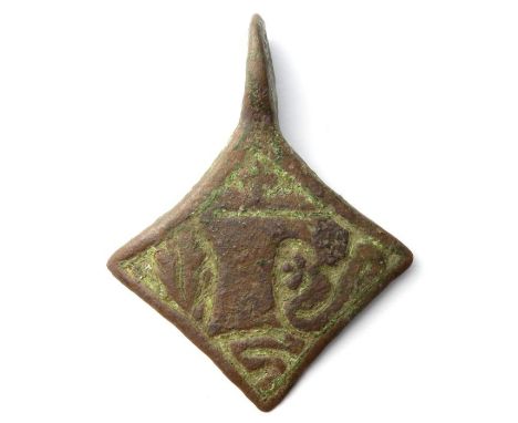 Medieval Harness Pendant Circa 14th-15th century AD. Copper-alloy, 40 mm x 31 mm. A lozenge-shaped pendant with a letter 'R' 