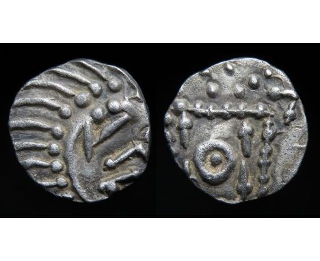 Series E sceatta. Continental Issue, circa, 695-740 AD. Silver, 12mm, 1.26g. Degenerate head right. R. Beaded standard enclos