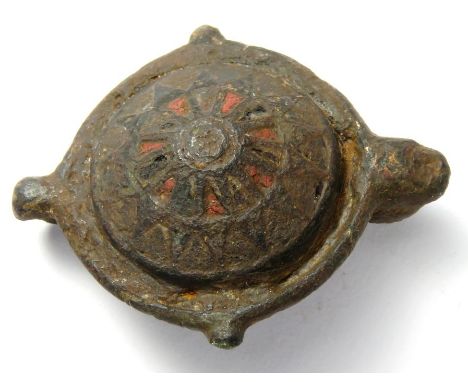 Roman Umbonate Brooch. Circa, 2nd century AD. Copper-alloy, 6.60 g, 32.55 mm. An umbonate type brooch decorated with triangul
