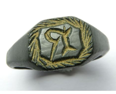 Medieval Seal Ring Circa, 14th-15th century AD. Copper-alloy, 26mm diameter (22mm internal) x 11mm, 9.8g. The bezel engraved 