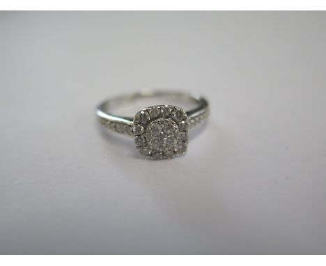 A 9ct white gold art deco style diamond cluster ring, diamond weight approx 0.5ct, stamped inside of ring - head size approx 