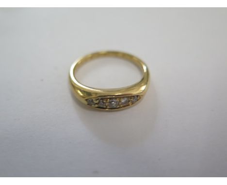 An 18ct yellow gold five stone diamond ring approx weight 4.7 grams - ring size L - in good condition 