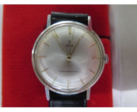 A gents Tudor stainless steel 1968 manual wind wristwatch with 34mm case on a leather strap with box and guarantee and replac