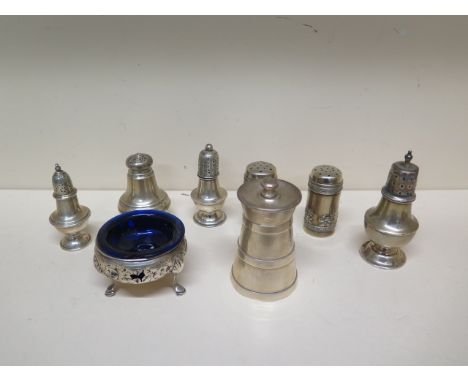 A collection of seven silver cruet pieces and a grinder - weighable silver approx 5.3 troy oz 