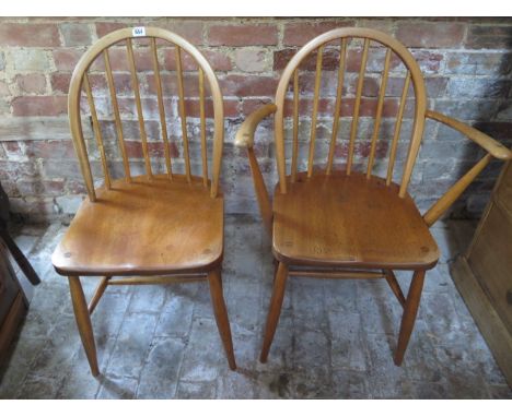 Two Ercol dining chairs including a carver 