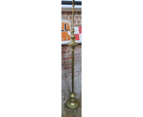 A brass extending standard lamp - will need rewiring 