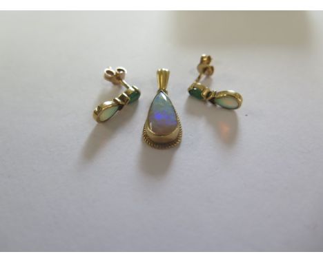 A 9ct opal pendant - 22mm tall - and two pairs of 9ct opal earrings - total approx weight 2.4 grams - all good condition 