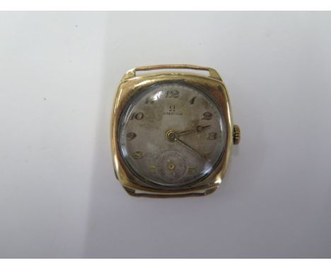A 9ct yellow gold Omega manual wind watch head - 29mm case - running, dial worn - approx weight 23 grams 