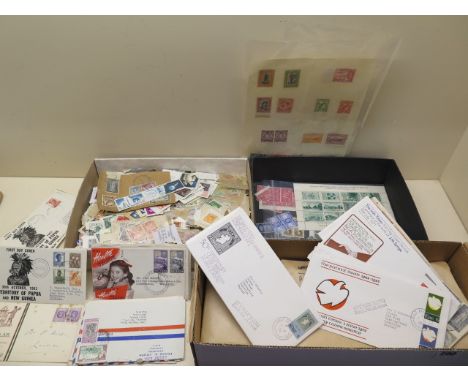 An interesting collection of loose stamps and 1st day covers including First Fiji Air Mail, Territory of Papua and New Guinea