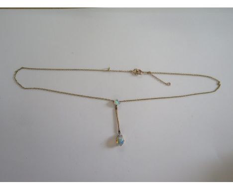 A 9ct opal necklace - a 9ct pendant, 42cm long, 4cm drop - approx total weight 3.3 grams - in good condition 