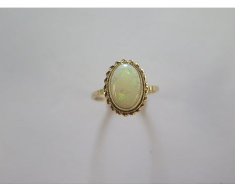 A 9ct yellow gold ring size S - approx weight 2.8 grams - slight bending to shank, otherwise good 