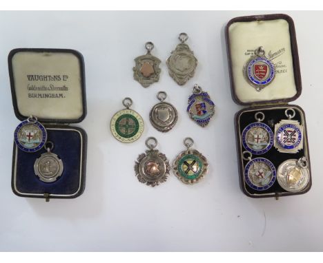 A collection of 14 silver and enamel fob medallions - approx weight 4.6 troy oz 