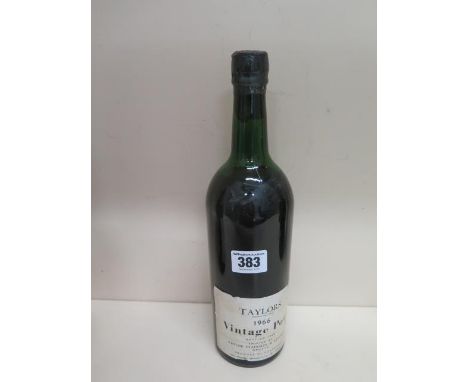 A bottle of 1966 Taylors Vintage Port - bottled in 1968 - level below base of neck, seal appears intact 