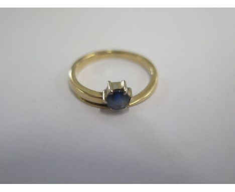 A yellow gold blue stone ring size L - approx weight 2.4 grams - surface tests to approx 9ct - in good condition 