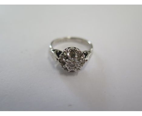 An 18ct white gold diamond ring size H - approx weight 3.5 grams - in good condition 