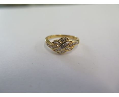 An 18ct yellow gold diamond ring size H/I - approx weight 2 grams - in good condition 