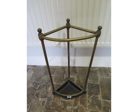 An early 1900's brass corner stick stand - Height 59cm x Width 29cm 