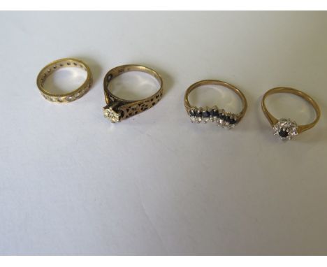 Four 9ct yellow gold rings sizes K,L,M,O - total approx weight 7.6 grams - all generally good 