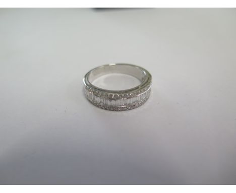 An 18ct fine quality white gold diamond half eternity ring - approx 1ct of diamonds - ring size O - in good condition 