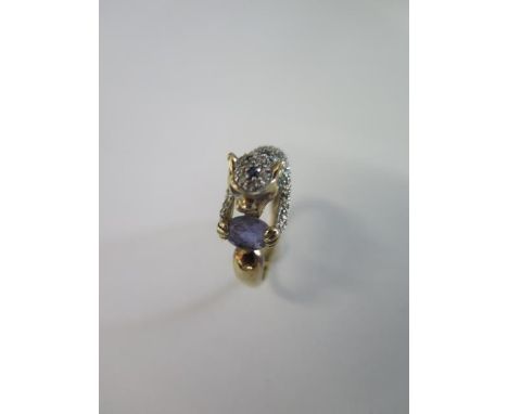 A 9ct yellow gold QVC Leopard ring size T - approx weight 4.2 grams - generally good 