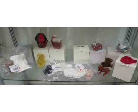 A collection of five miniature Steiff Christmas bears with balloon, car, plane and sleigh - all sealed except one 