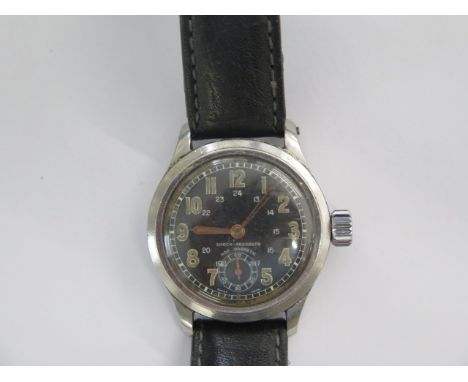 A mid size stainless steel manual wind wristwatch with a black dial case no 365402 - 30mm case - replacement winder, in runni
