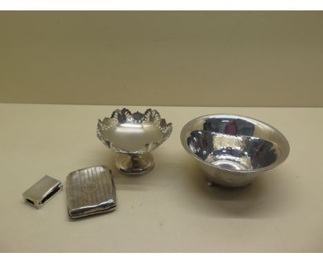 A silver cigarette case and match case - both dented - a silver footed dish and a continental silver bowl marked 830 - total 