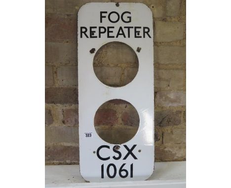 An enamel Fog Repeater CSX 1061 railway sign - 61cm x 26cm - some small chips mainly to holes 