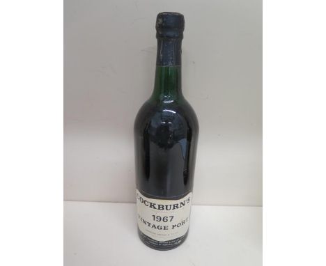 A 75cl bottle of Cockburns 1967 vintage Port - seal good, level to base of neck 
