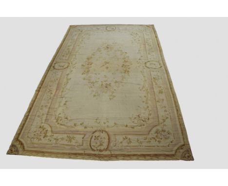 Impressive Aubusson carpet, France, circa 1850, 20ft. 7in. X 12ft. 5in. 6.27m. X 3.78m. Overall fading; some surface marks in