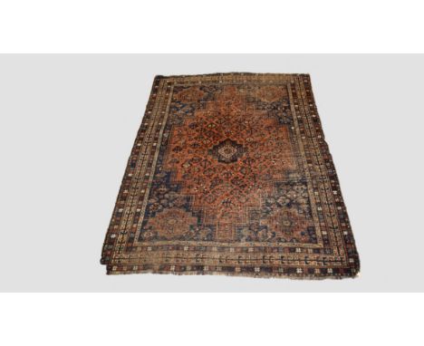 Fars carpet, Shiraz district, south west Persia, circa 1930s-40s, 9ft. 9in. X 6ft. 11in. 2.97m. 2.11m. Overall wear, heavy in