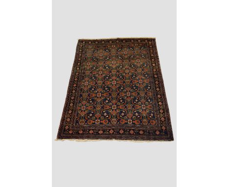 Mahal carpet, north west Persia, circa 1940s-50s, 10ft. 2in. X 7ft. 4in. 3.10m. X 2.24m. Mid-blue field with all over stylize
