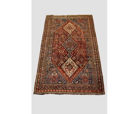 Attractive Qashqa'i rug, Fars, south west Persia, early 20th century, 9ft. 10in. X 6ft. 3m. X 1.83m. Overall even wear; fabri