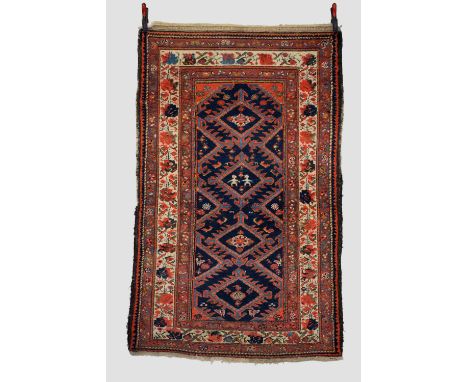 Kurdish rug, Malayer area, north west Persia, circa 1930s, 6ft. 5in. X 3ft. 11in. 1.96m. X 1.20m. Slight wear in places; fray