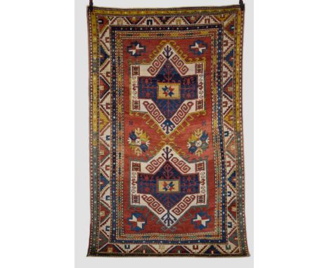 Superb Fachralo Kazak twin medallion rug, south west Caucasus, circa 1900, 8ft. 5in. X 5ft. 2in. 2.56m. X 1.58m. Overall even