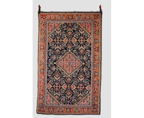 Mahal rug, north west Persia, circa 1920s-30s, 6ft. 7in. X 4ft. 2in. 2.01m. X 1.27m. Slight wear in places. Dark blue diamond