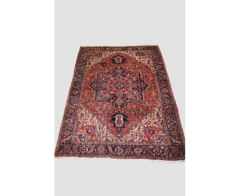 Attractive Heriz carpet, north west Persia, circa 1920s-30s, 13ft. 1in. X 9ft. 6in. 3.99m. X 2.90m. Few small splits in place